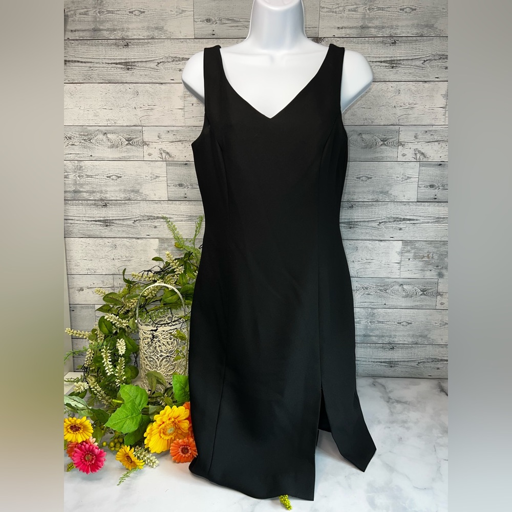 Moda VS black sleeveless dress with front slit on side . Size 2
